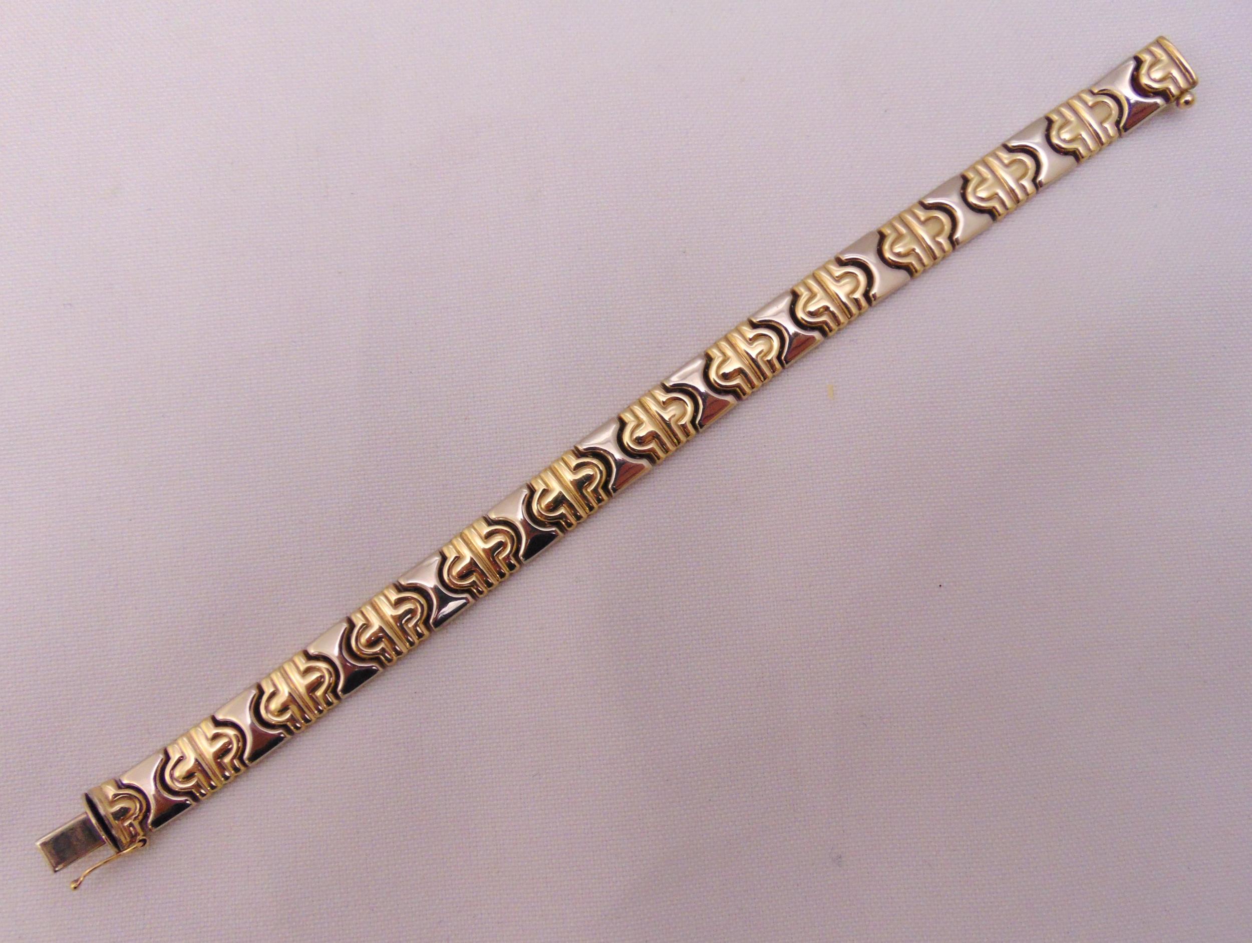 9ct two gold fancy link bracelet, approx total weight 13.9g