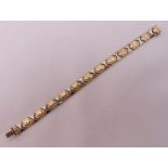 9ct two gold fancy link bracelet, approx total weight 13.9g