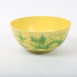 A Chinese yellow ground green glaze 'dragon' bowl, 6 character mark, diameter 12cm