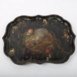 A Victorian Japanned papier mache tea tray, hand painted and gilded decoration with landscape scene,