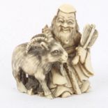 A Japanese carved ivory netsuke, shepherd with goat, signed, height 4cm