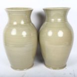 A large pair of French celadon glaze baluster vases, signed, height 40cm