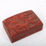 A Chinese red cinnabar 'dragon' box, 15cm x 10cm