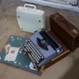 A Smith Corona cased portable typewriter, another, an attache case, and an album of photos and