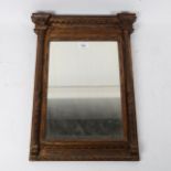 A small Regency gilded architectural framed rectangular wall mirror, plain dentil cornice, 52cm x