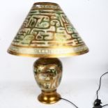A large painted plaster table lamp and shade, height 65cm