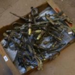 A boxful of decorative brass wall sconces