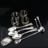 A 19th century Russian silver and niello spoon, silver Sherry decanter label, napkin rings and