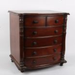 A 19th century mahogany apprentice piece table-top bow-front chest of drawers, W40cm, H43cm, D29cm