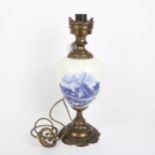 Blue and white transfer decorated brass urn table lamp, height 44cm
