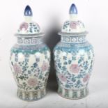 A large pair of Chinese baluster jars and covers, height 50cm