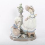 A Lladro porcelain figural group, A Stitch In Time, model no. 5344, height 24cm
