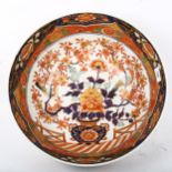 A Chinese porcelain bowl with floral decoration, 6 character mark, 40cm across