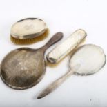 Silver dressing table items, including hand mirrors and clothes brush