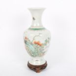 A Chinese famille verte porcelain baluster vase, hand painted floral decoration, height 24cm, on