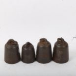 A set of 4 Japanese balance scale weights, with character marks, largest height 6cm