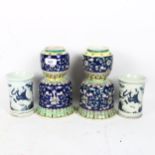 A pair of Chinese blue and white pottery cylinder vases, and a pair of Chinese blue ground vases,