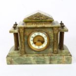 An early 20th century green onyx architectural 8-day mantel clock, case height 28cm, with pendulum
