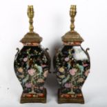 A pair of Oriental porcelain table lamps with brass mounts, 46cm overall