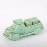 An Art Deco Continental green glaze pottery novelty pickup truck cruet, model no. 6991, length 15cm