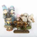 A large Continental porcelain musician group, a pair of French porcelain figures, German beerstein