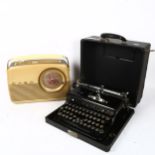 Cased Royal typewriter, and Bush battery operated radio (2)