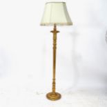A fluted giltwood standard lamp and shade, height including shade 180cm