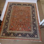 A red and cream ground Persian design carpet, 300cm x 244cm