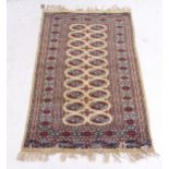 A cream ground Afghan rug, 162cm x 95cm
