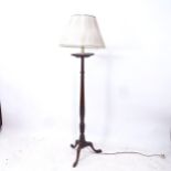 An Edwardian mahogany tapered standard lamp and shade, height including shade 176cm