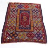 A red ground Persian rug, 154cm x 124cm
