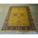 A yellow ground Persian design carpet, 366cm x 270cm (viewing by appointment only)