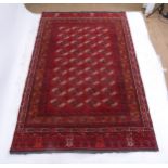 A red ground Afghan carpet, 246cm x 162cm