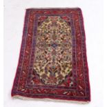 A red ground Anatolian rug, 136cm x 76cm