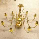 A Dutch style brass 8-branch chandelier