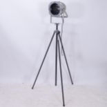 An aluminium-cased stage light on tripod stand
