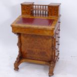 A reproduction burr-walnut Davenport, with raised drawer-fitted super structure, W62cm, H96cm, D57cm