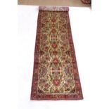 A cream ground Hamadan runner, 325cm x 80cm