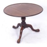 A Georgian mahogany circular low table on tripod base, W80cm, H60cm