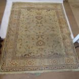 A cream ground Persian design carpet, 310cm x 243cm