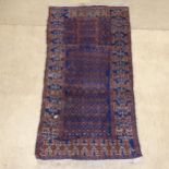 A blue ground Persian prayer rug, 139cm x 75cm