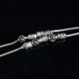2 silver snake link charm bracelets