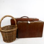 A crocodile-effect leather suitcase, 50cm, a larger suitcase, and a wicker basket