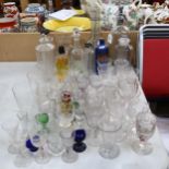 Antique drinking glasses, various eye baths, and measuring glasses, chemist bottles, perfume bottles