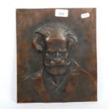 An embossed copper portrait plaque, impressed Renzo, 1946, height 28cm