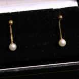 A pair of unmarked gold pearl drop earrings