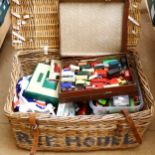 Large wicker basket, containing various Vintage toy cars and vehicles