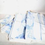 Various table linen with blue embroidered decoration