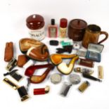 Various smoking paraphernalia, including cased pipes, oak tobacco jar, Presta stopwatch, lighters