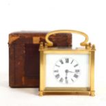 A small French rectangular brass-cased carriage clock, in fitted case, case height 8cm, working